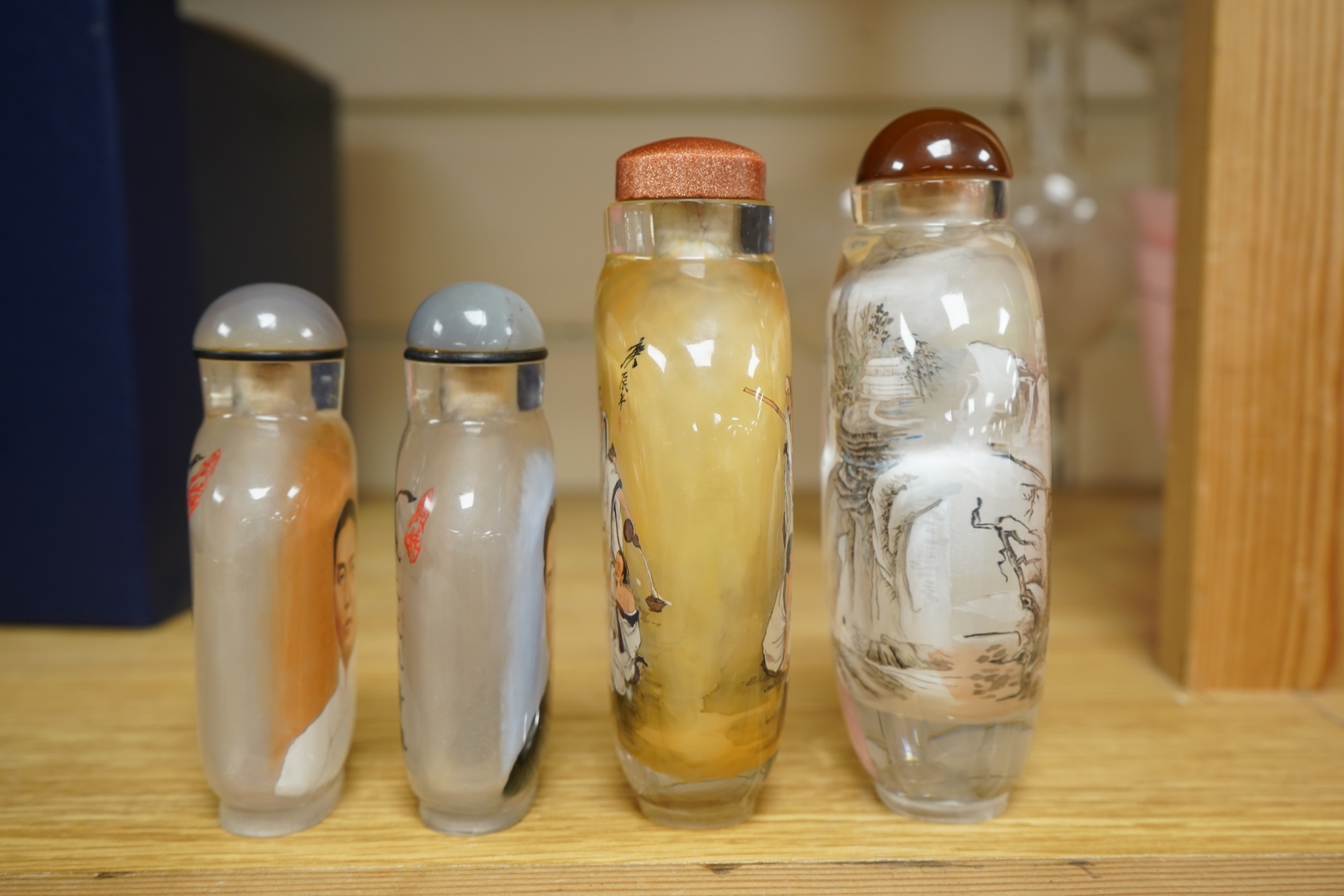 Four Chinese inside painted glass snuff bottles, 1960's-80's, tallest 13.5cm